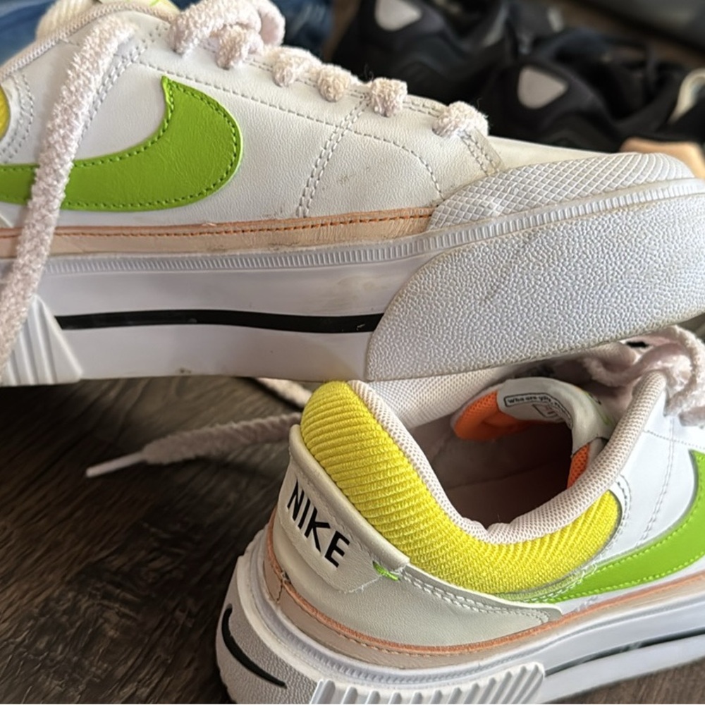 Nike White and Green Sneakers
Woman’s